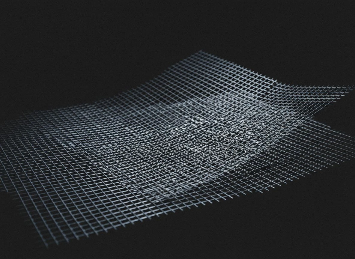 Close-up of overlapping steel mesh grids with one layer misaligned, representing attribution signal ambiguity.